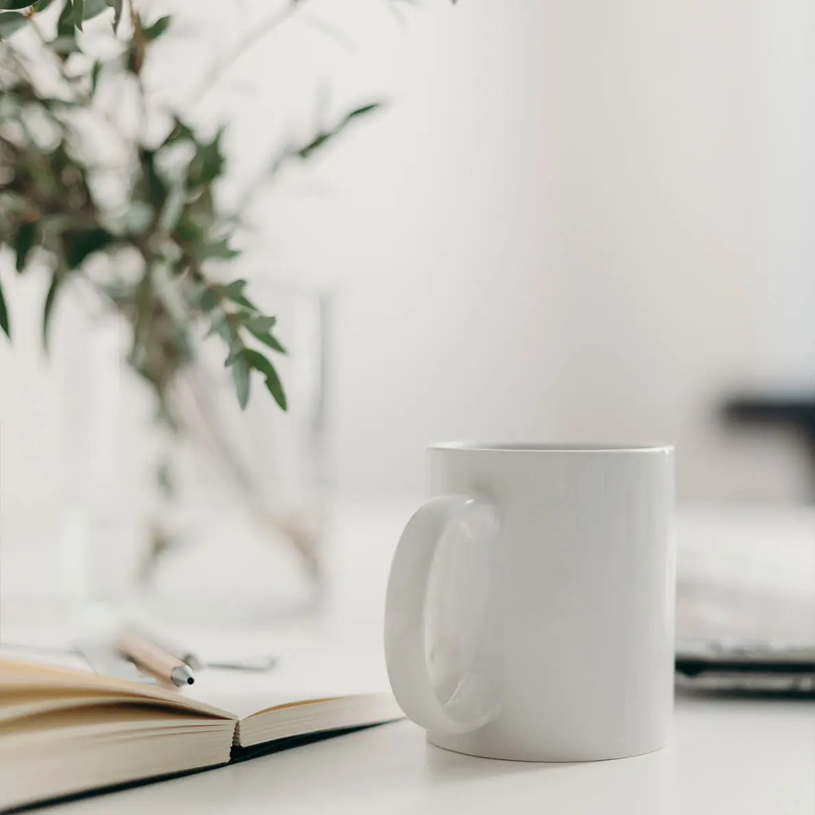 coffee-cup-and-binder-on-desk